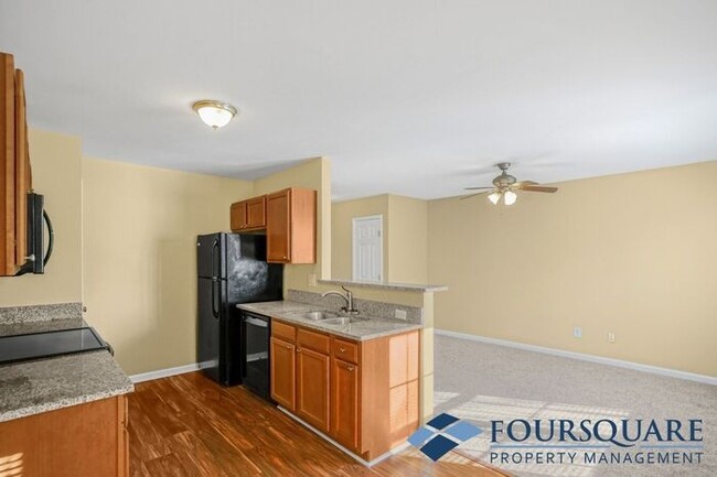 Building Photo - Charming 3-Bedroom Townhome with First-Floor Suite & Off-Street Parking – Near Capital Blvd & I-440