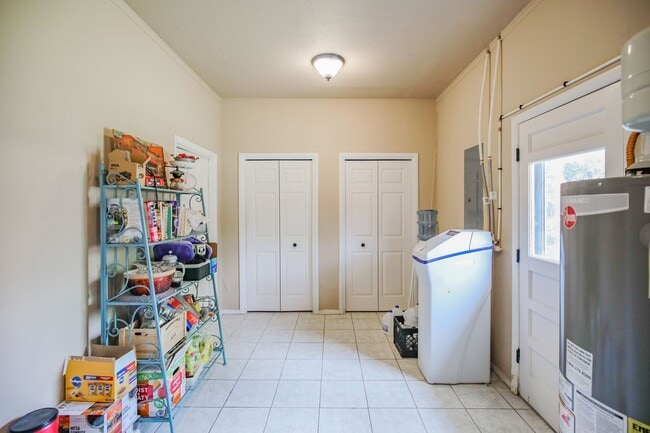 Building Photo - Three Bedroom Home with Plush Backyard