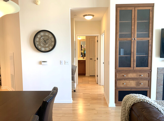 Custom built-in cabinet with shelves and drawers for entertainment components and storage. - 500 E Grant St