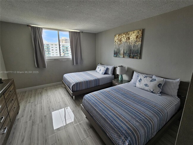 Building Photo - 19370 Collins Ave