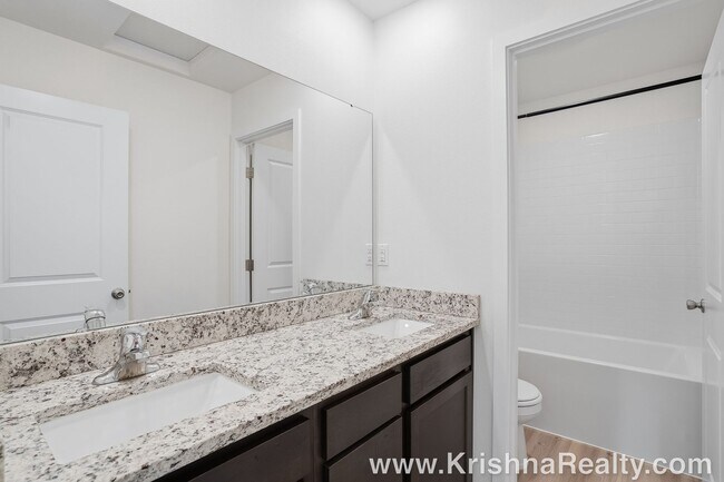 Building Photo - Lovely 5 BD | 3 BA | Loft | Main-Level Suite | 2,376 SF | Corner Lot | Riverside Estates