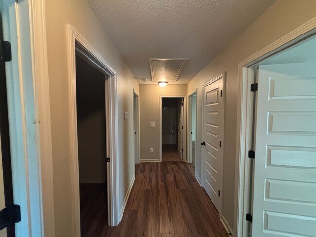Building Photo - This property blends ample living space and storage with functional amenities.