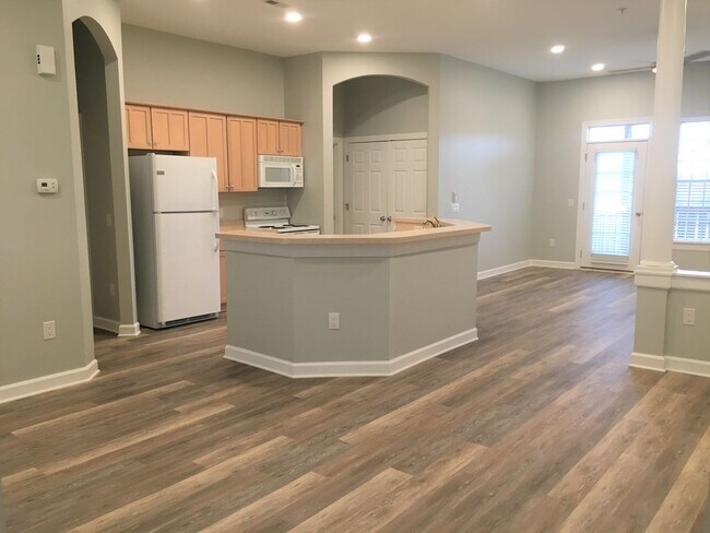 Building Photo - Inviting, modern two bedroom with garage parking, balcony views and a wonderful location in Chape...