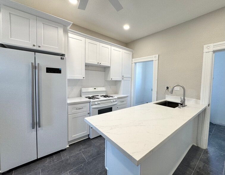 Kitchen without Staging - 414 Kentucky St