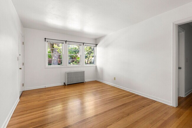 Building Photo - 235 NE 61st Ave