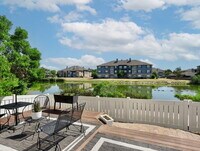 Building Photo - Lakeside 3 Bed/2.5 Bath Townhome in Gateway Community! Quiet, Scenic Living in The Heart Of Denver!