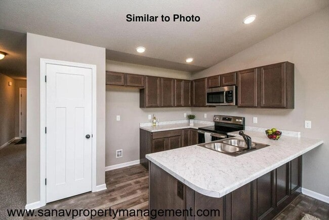 Building Photo - Charming Hoover Ranch in Bondurant – Move-In Ready for July!