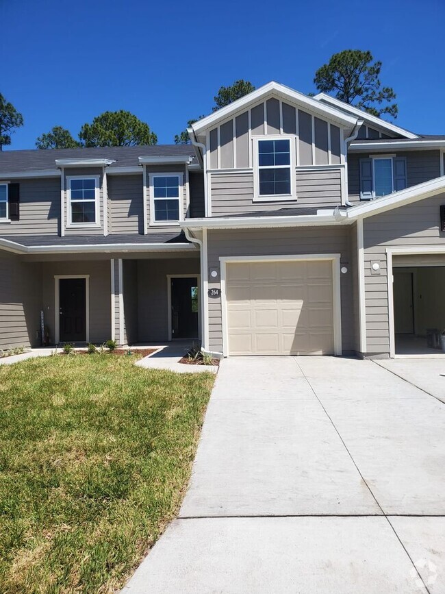 Building Photo - NEW 3 BEDROOM 2.5 BATH TOWNHOME