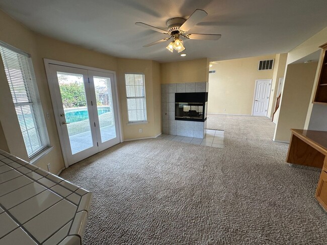 Building Photo - Spacious 4-Bedroom Rental with Pool & Hot ...