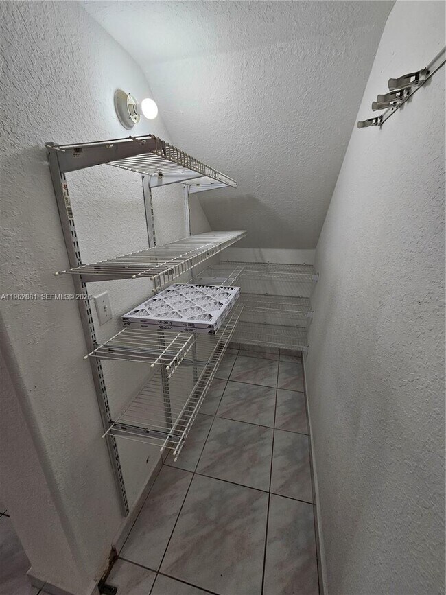 Building Photo - 10915 W Okeechobee Rd