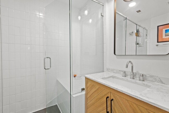 Building Photo - Modern Living Meets Urban Charm in Bankers...