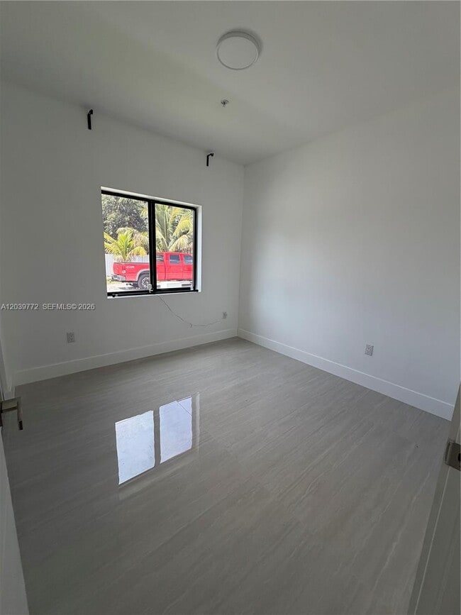 Building Photo - 9708 NW 26th Ave