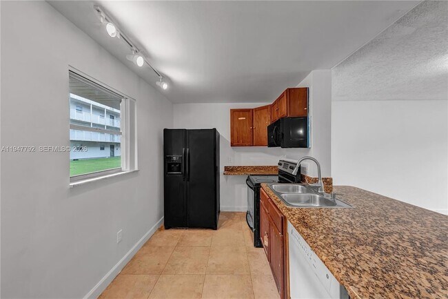 Building Photo - 2800 NW 56th Ave