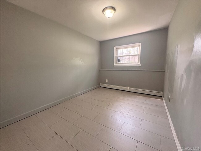 Building Photo - 69-47 De Costa Ave