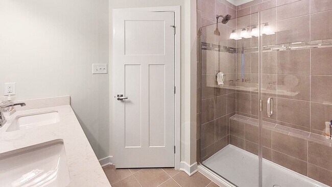 Building Photo - Exceptional Luxury Townhouse with 2 Car Ga...