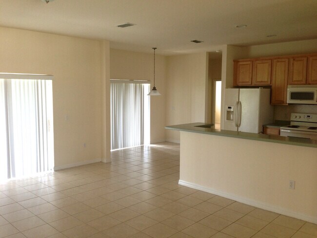 Building Photo - 3/2 House in the Gated Spring Lake Village Community with Water View