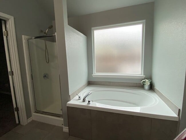 Building Photo - WELCOME TO YOUR CHARMING HOME AT THE COTTA...