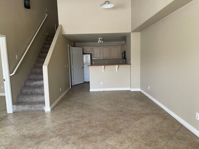 Building Photo - Spacious Condo with Loft & 2-Car Garage – Minutes from the Strip!