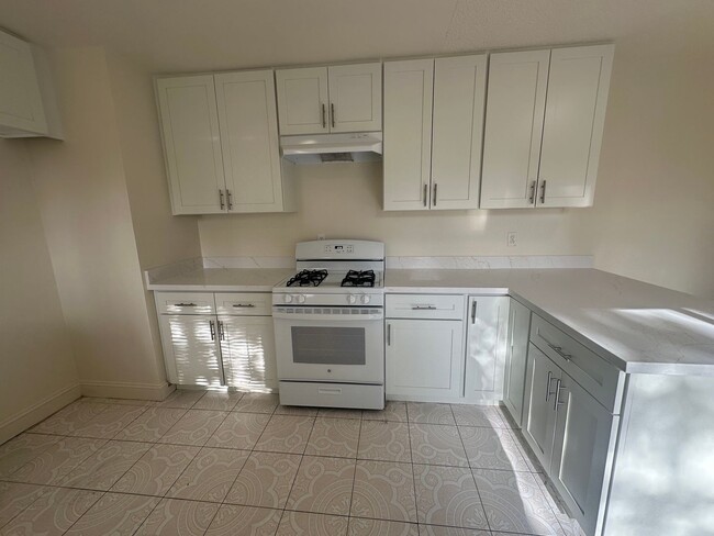 Building Photo - Recently Updated 4 Bedroom Home with Yard