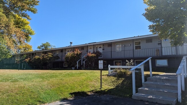 Building Photo - Conveniently located Riverbend Apartments feature a quiet community with a large green space