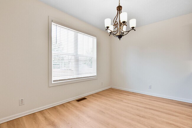 Building Photo - Pet Friendly Three Bedroom with Bonus!
