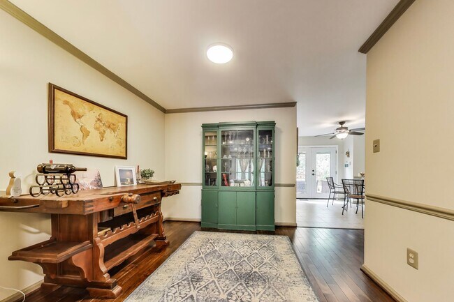 Building Photo - COMINGS SOON - Beautifully Updated Winchester-Built Townhome Backing to Serene Parkland.