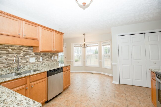 Building Photo - "Charming 4-Bedroom Home with Granite Coun...