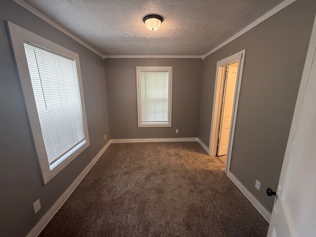 Building Photo - Cutest 2-bedroom cottage with a loft! Huge shady backyard for all things outdoor! All Brand new a...