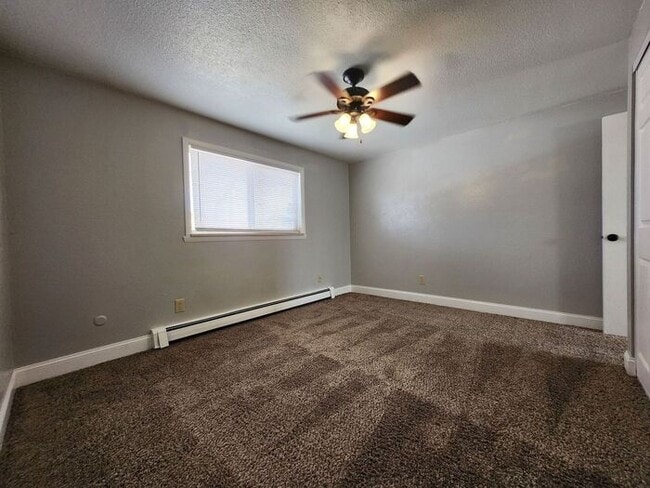 Building Photo - Cozy 2-Bed, 1-Bath Apartment – Upper Level with Covered Outdoor Space!