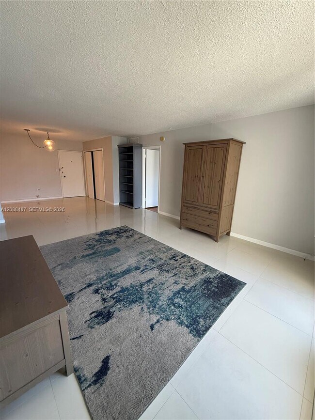 Building Photo - 5555 Collins Ave