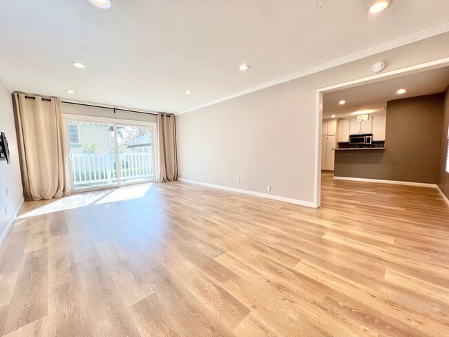 Primary Photo - Contemporary 2 Bed Condo with 2 Garage Parking Spaces, Community Pool, and 3 Private Balconies