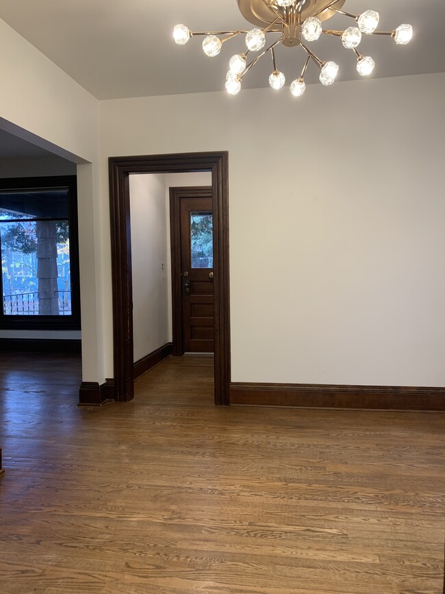 Dining Room looking toward front entry/ living room. - 1023 SE Bidwell St