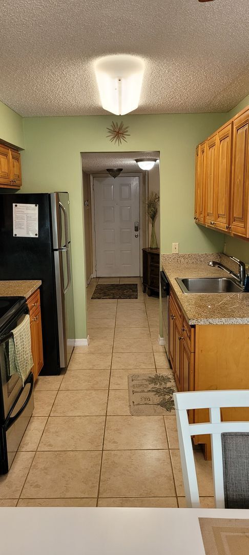 Building Photo - Funished Resort Style Condo in Gated Community- River Front