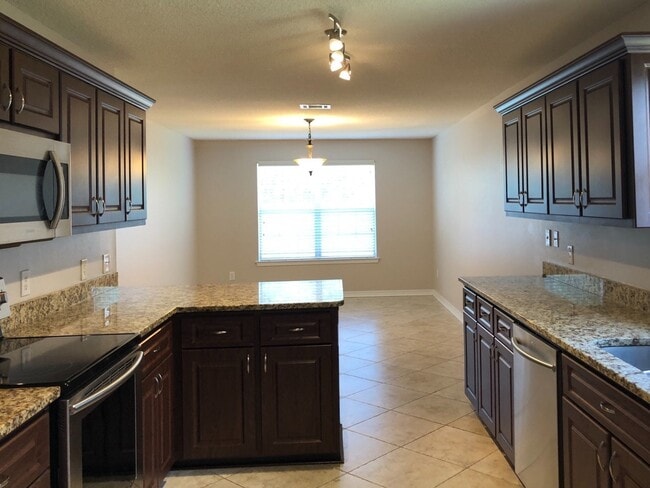 Building Photo - Gulf Breeze - Grand Ridge - 4 bedroom, 2.5...