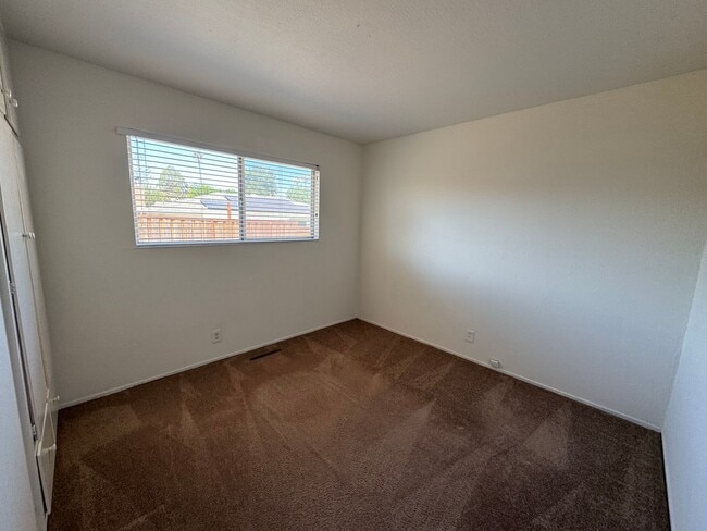 Building Photo - Single level 4 bedroom, 2  bath home – mov...