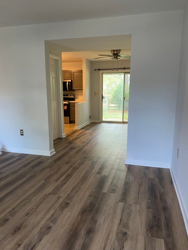 Living room into dining room - 4 Doncaster Ct