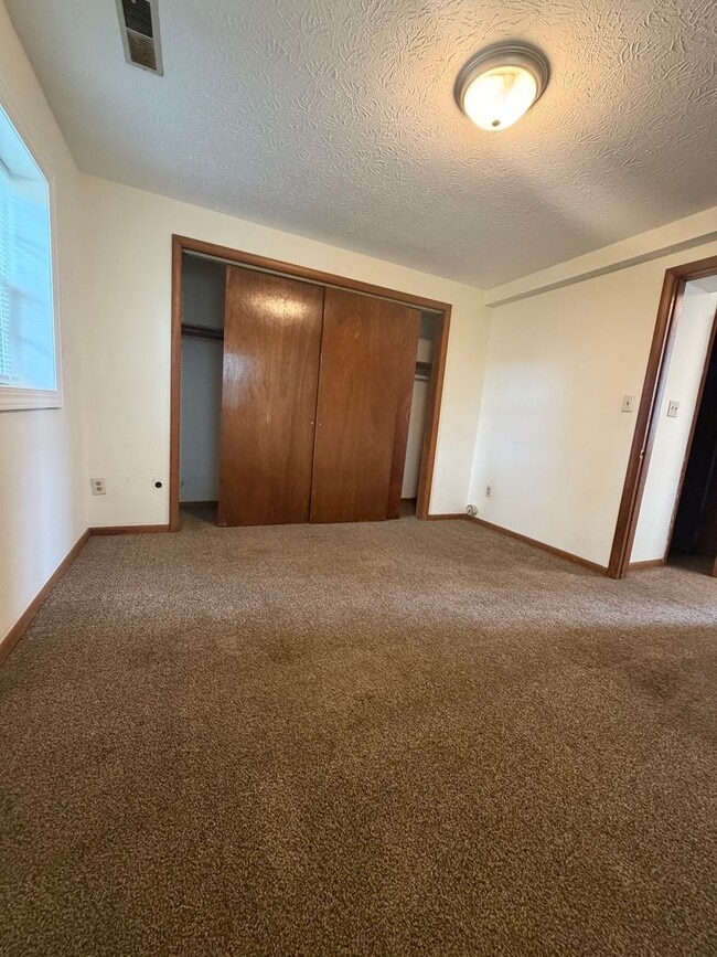 Building Photo - One Bedroom Duplex