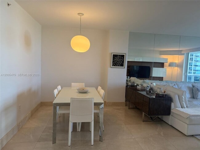 Building Photo - 10275 Collins Ave