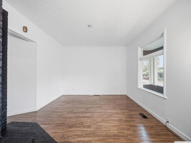 Building Photo - Stunning Updated Home in North Spokane | Bright Interiors, Modern Kitchen & Private Patio