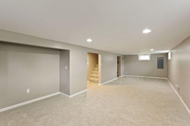Building Photo - Move-In Ready Cape Cod with 3 Finished Levels & Huge Backyard