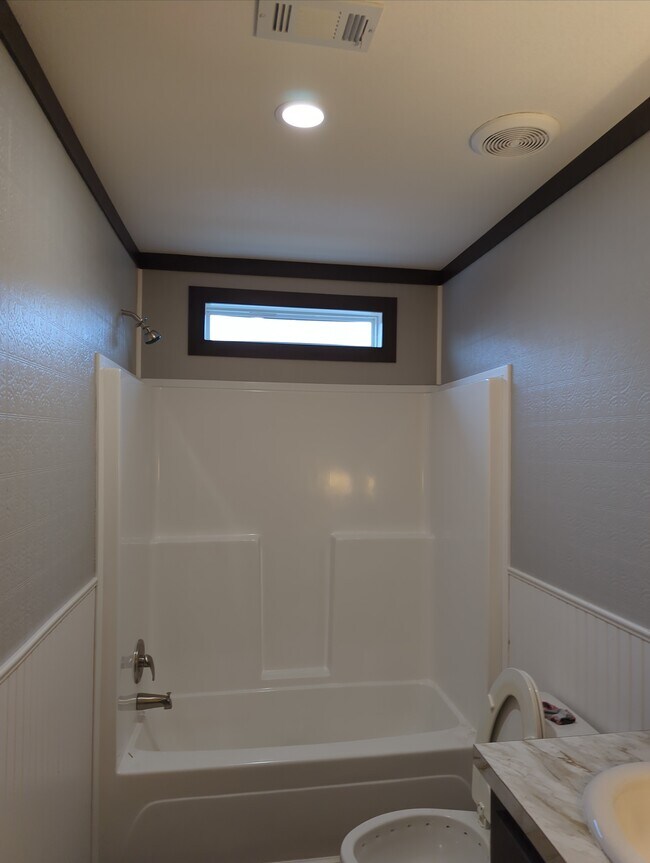 Guest Bathroom built in storage, shower/tub combo - 179 Davis Rd