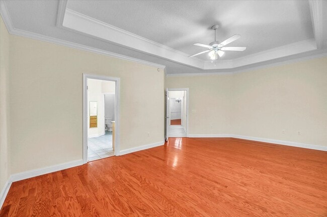 Building Photo - Stunning all-brick home on a large wooded lot