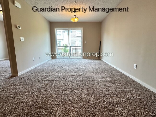 Building Photo - Champlin Town Home, 2 Car Garage, Balcony,...