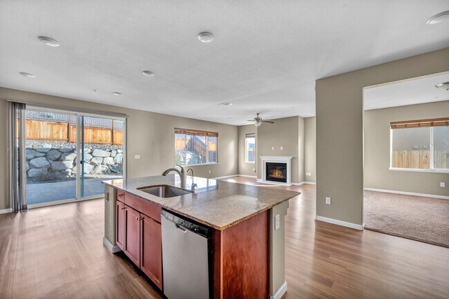 Building Photo - Sun-Filled, Spacious Living with a Three-Car Garage