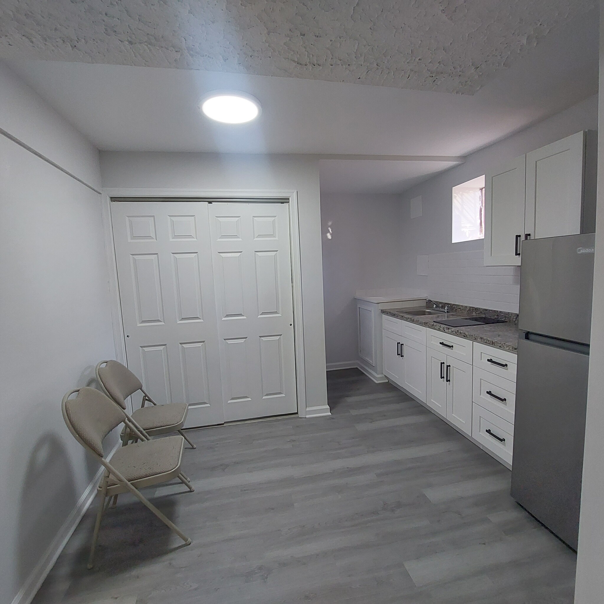 Kitchenette area with new appliances - 8527 Piney Point Ct