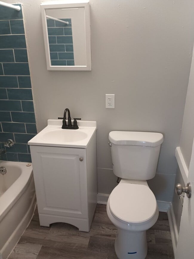 Building Photo - Coming Soon: Charming & Light-Filled 2-Bedroom Duplex!