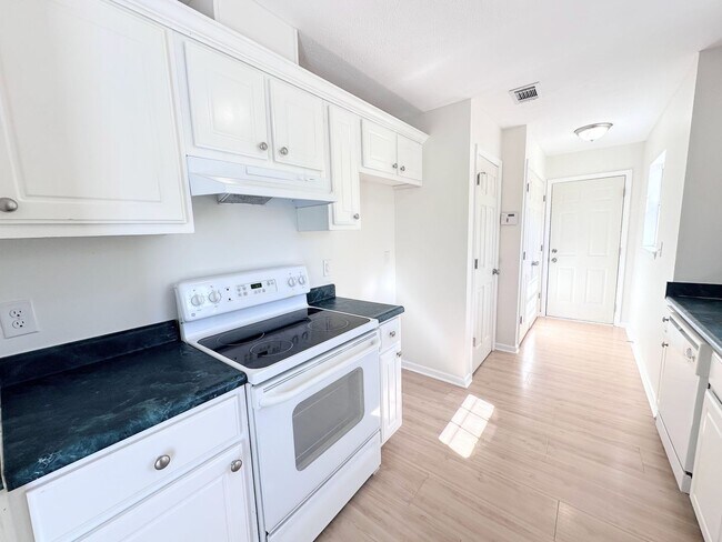 Building Photo - Branching Out in Laurel Oaks