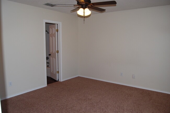 Building Photo - Stylish 3/2/2 Home with Fireplace and Cove...