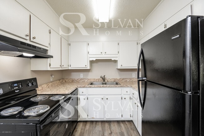 Building Photo - Prepare to fall in love with this 4 bedroom, 2 bathroom home