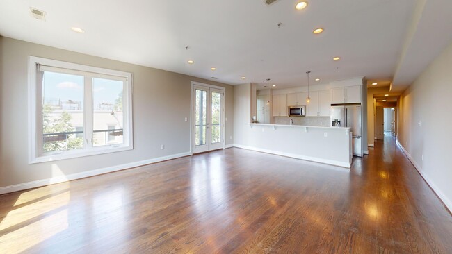 Building Photo - Stunning Three Bedroom Penthouse Condo W/Three Private Outdoor Spaces & Parking Included!